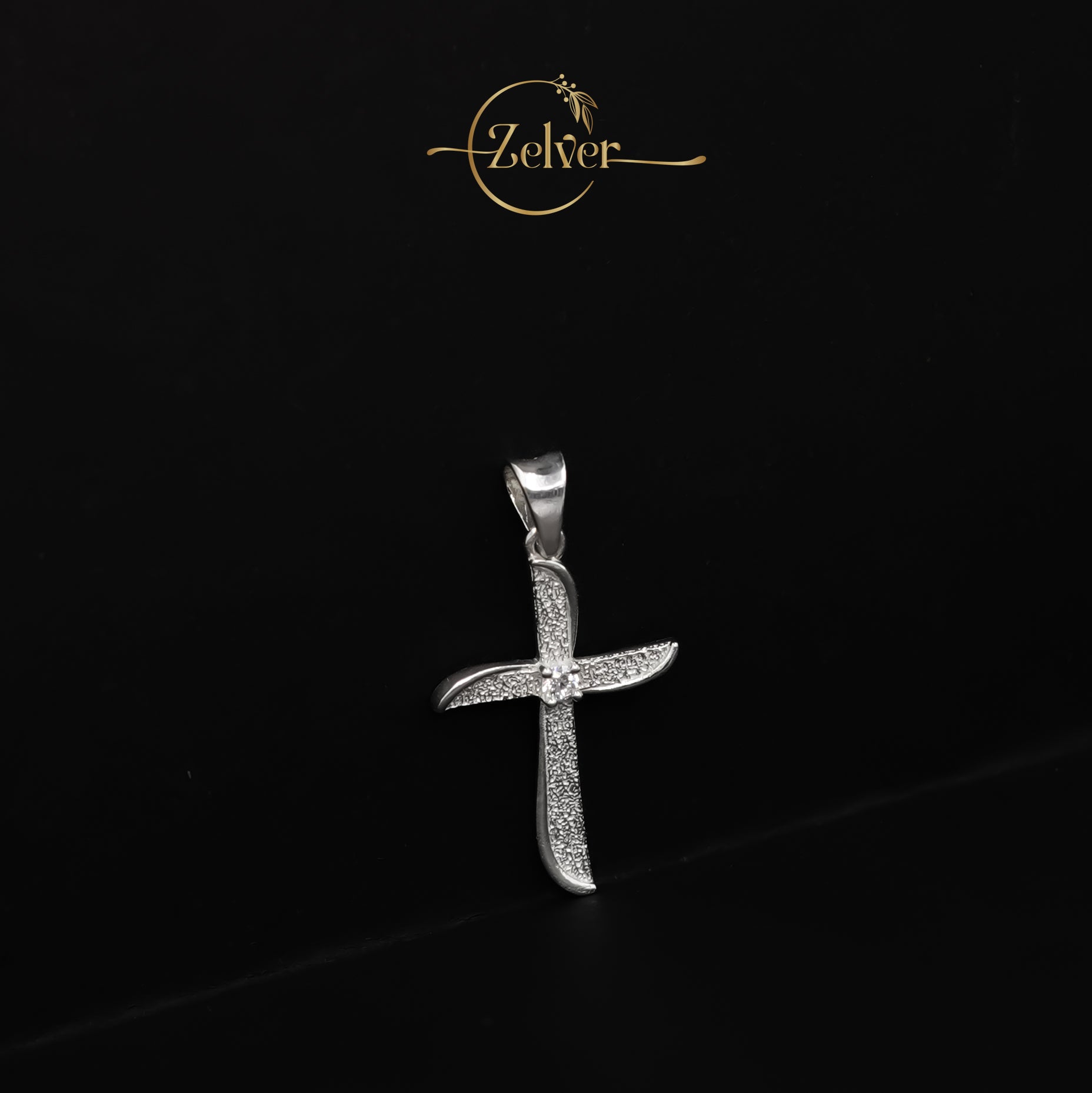 The Stardust Curve Cross Charm