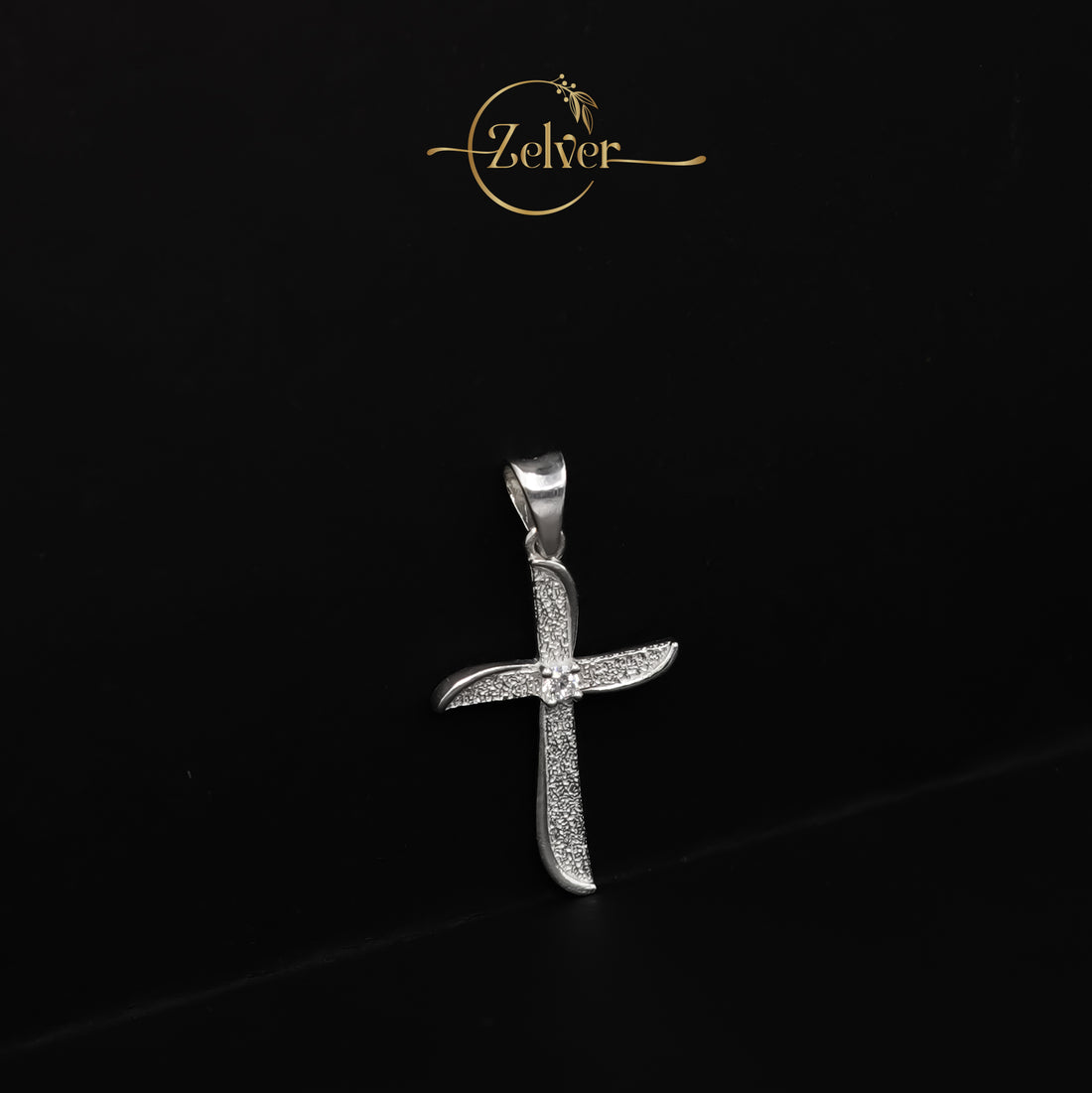 The Stardust Curve Cross Charm