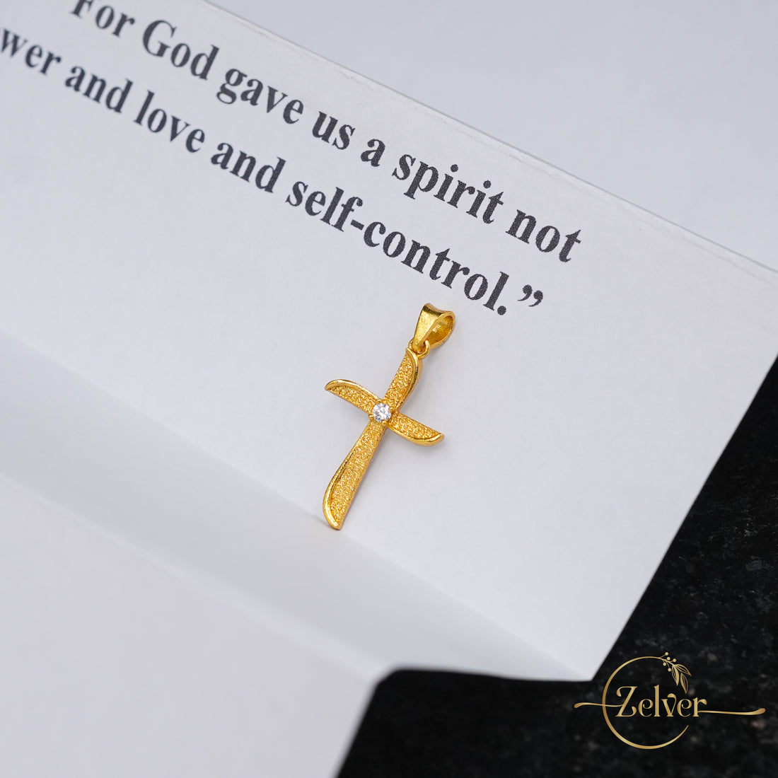 The Stardust Curve Cross Charm