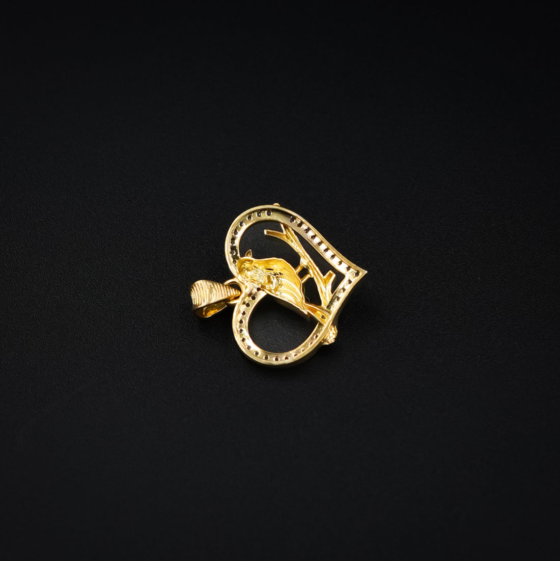 Heart-shaped bird pendant