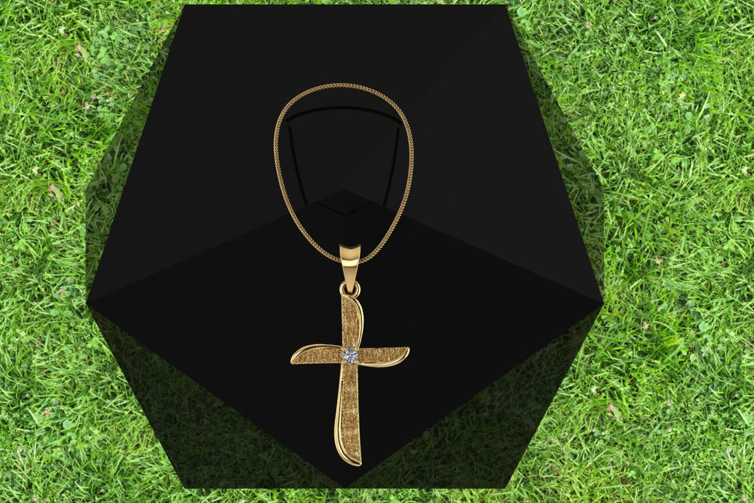The Stardust Curve Cross Charm